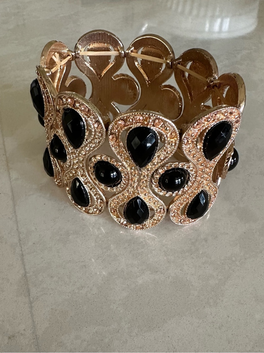 Gold-Tone Bracelet with Black Teardrop Stones